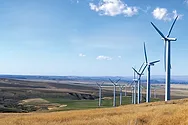wind farm with hills