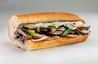 Photo of a sub sandwich with mushrooms cheese and green peppers.