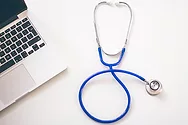 stethoscope and laptop