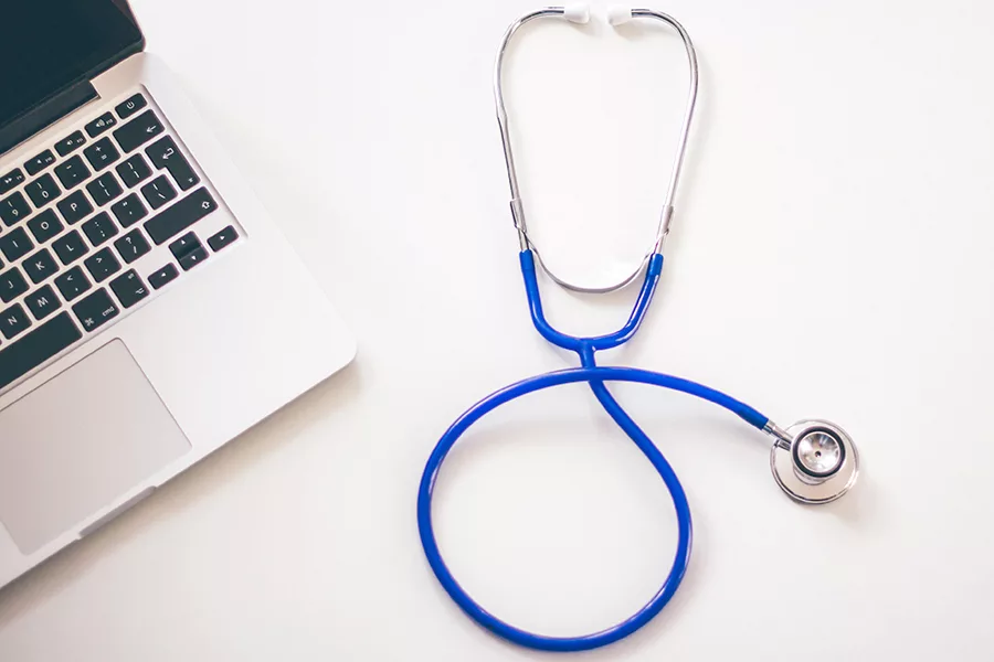 stethoscope and laptop