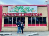 Javis Chicken and Churros owners stand outside their new location in Pasco.