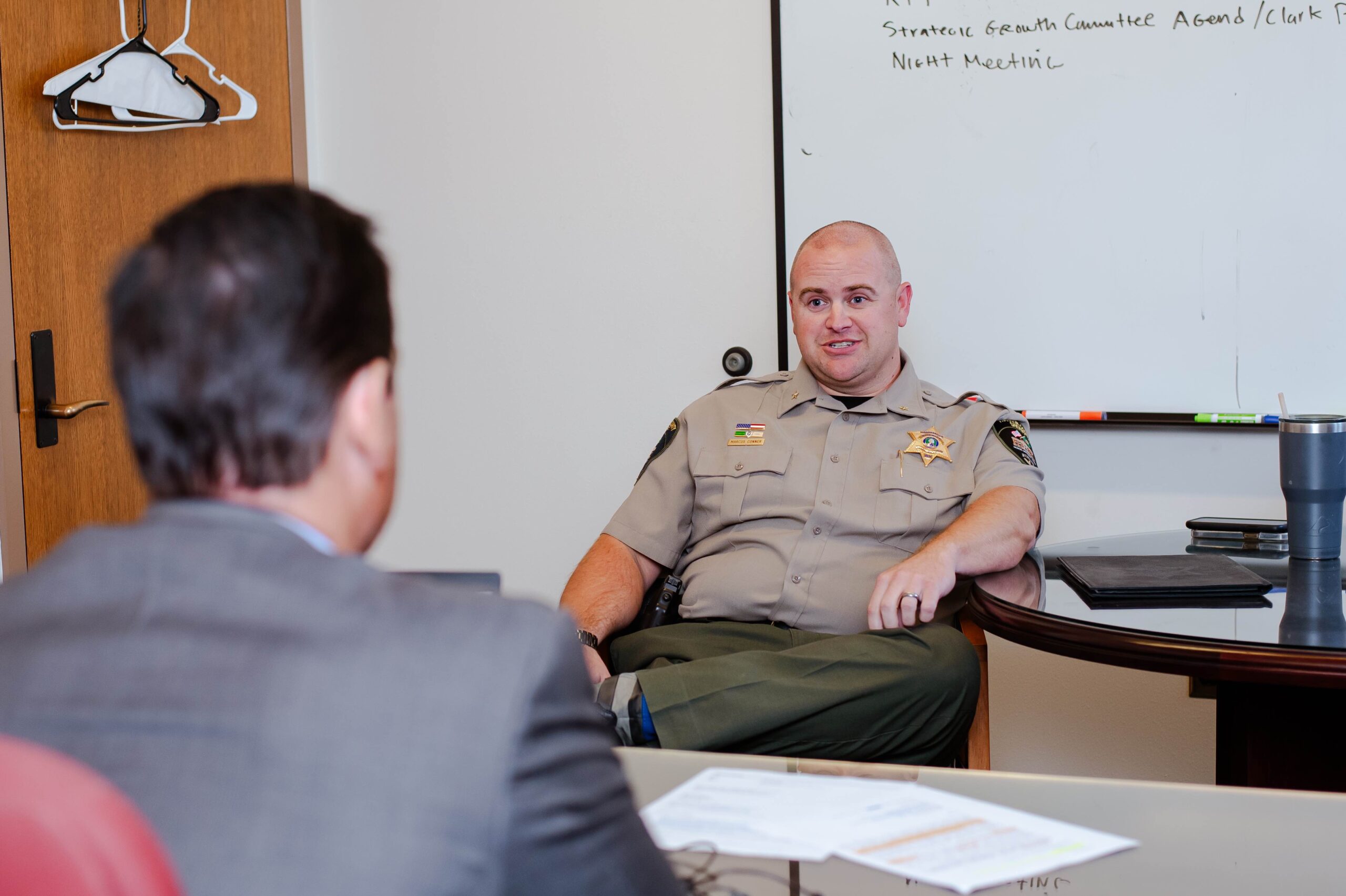 Franklin County Sheriff Marcus Conner speaks with County Administrator Mike Gonzalez. 