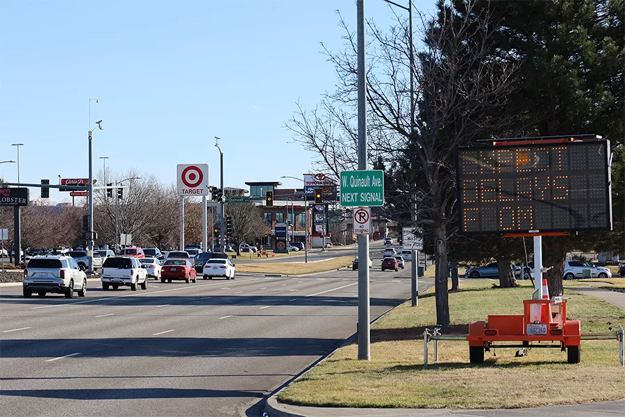 A shot near the intersection at Columbia Center Boulevard and Quinault, Target can be seen nearby along with a lit construction sign that says "Expect Delays From".