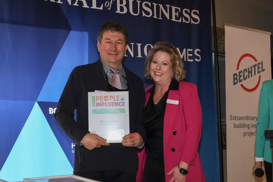 Tim Arntzen accepting award.