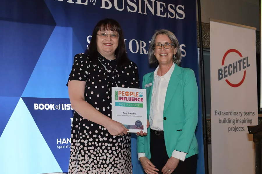 Amy Basche accepting award.