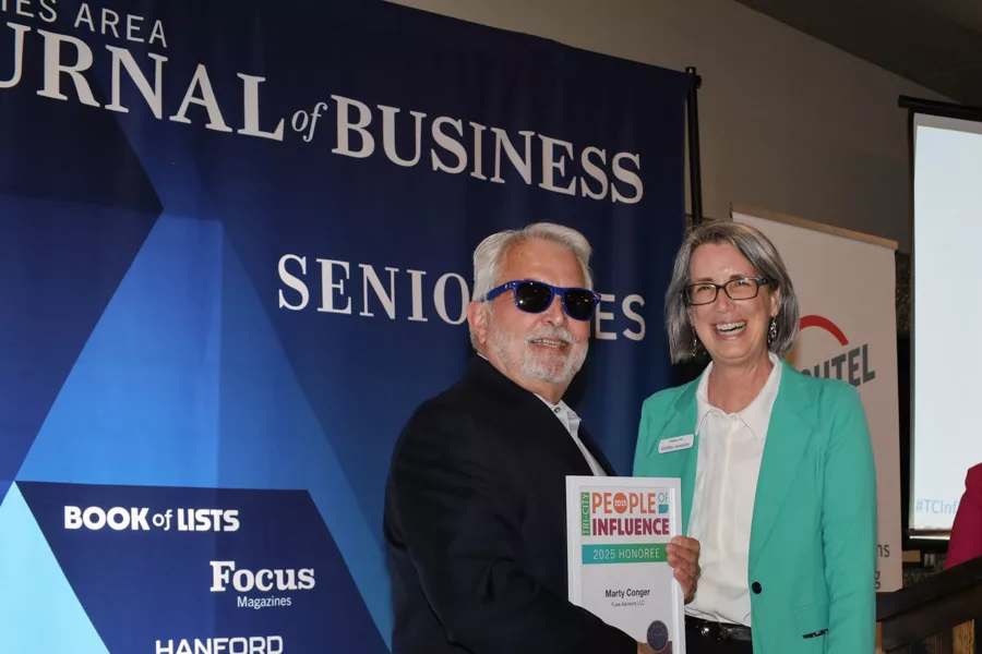 Marty Conger accepting award.