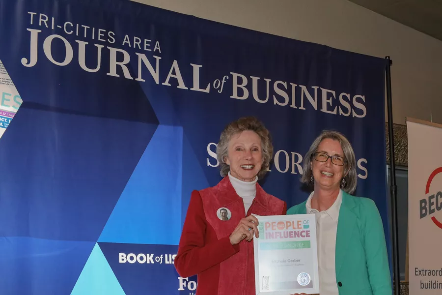 Michele Gerber accepting award.