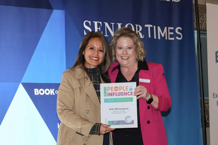 Vicki Montegudo accepting award.