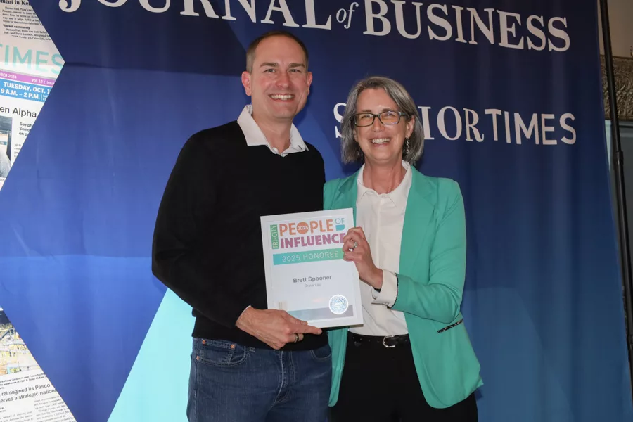 Brett Spooner accepting award.