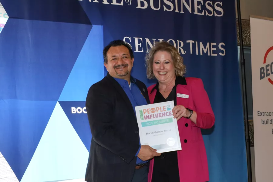 Martín Valadez Torres accepting award.