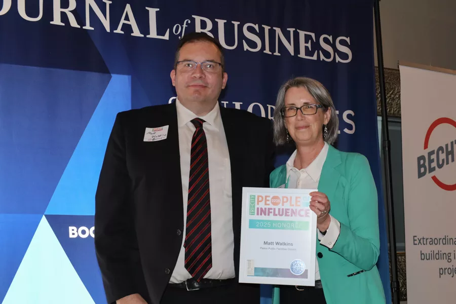 Matt Watkins accepting award.