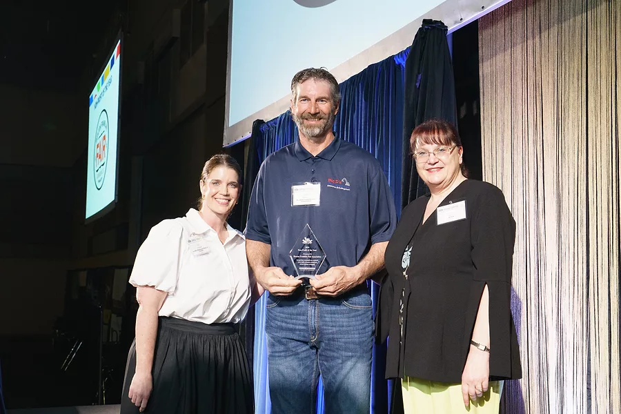 Photo of Non-Profit of the Year award winner Duane Howard, Benton Franklin Fair Association with Emily Volland, Kadlec and Amy Basche, Tri-City Regional Chamber