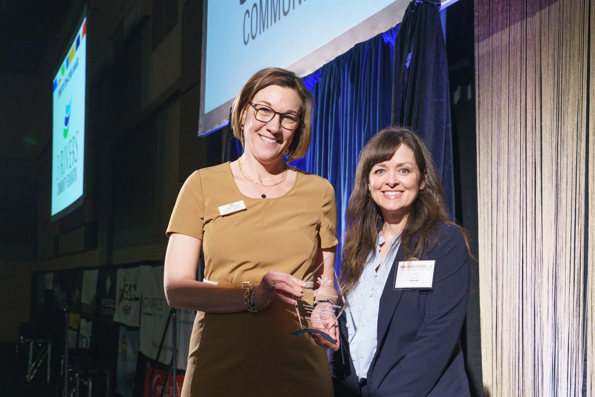 Photo of Spirit of Tri-Cities award winner Abbey Cameron, 3 Rivers Community Foundation, and Trish Herron, Tri-City Regional Chamber