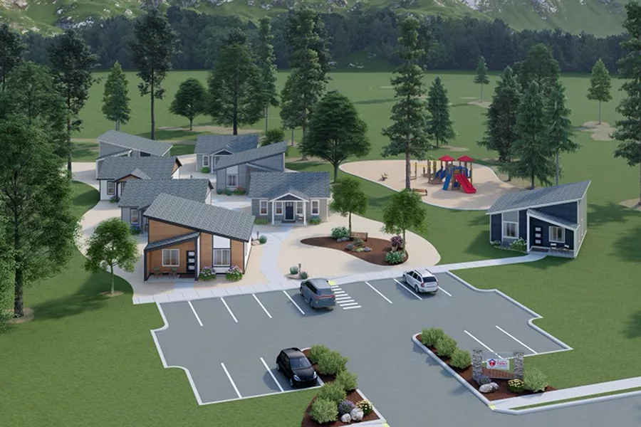 Rendering of several small homes with a playground nearby.