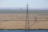 Power towers in a field.