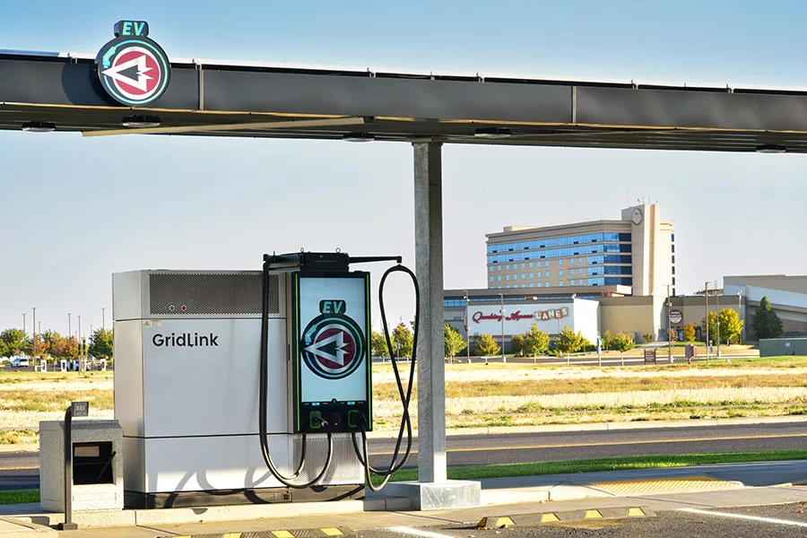 An EV charging station with Wildhorse in the background.