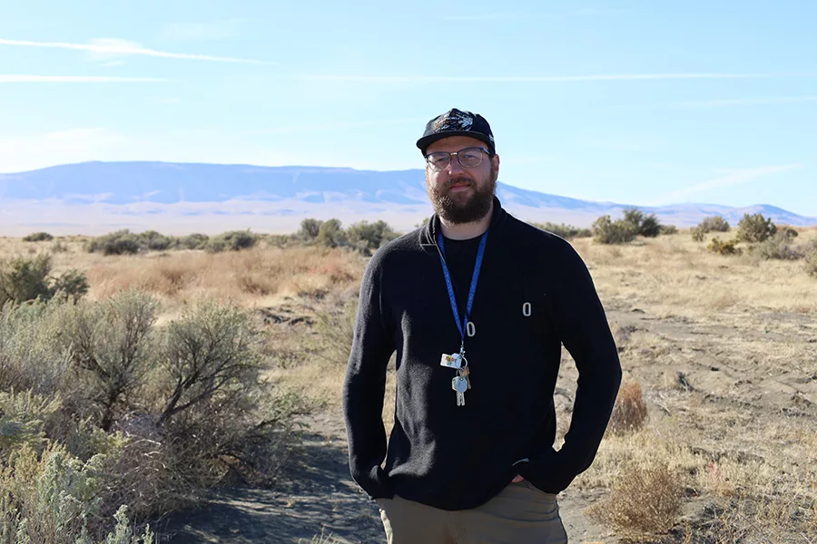 A man standing in a field.