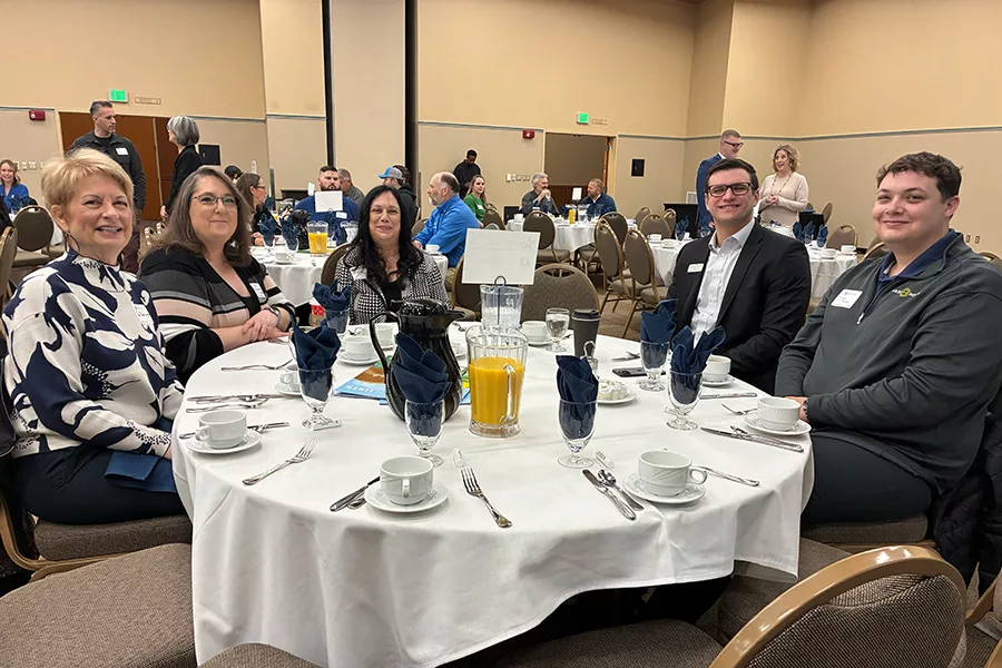 A group of people at a table.