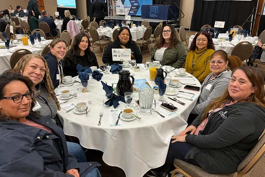 A group of people at a table.