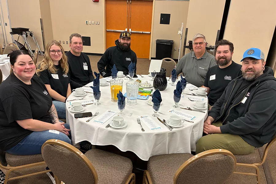 A group of people at a table.