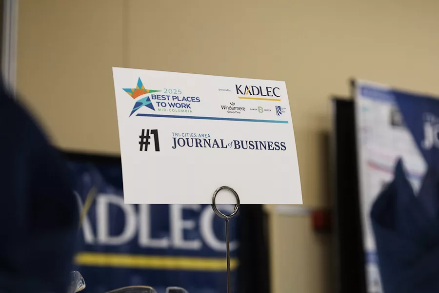 A name card that says, "Journal of Business".