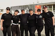 A group photo of food truck workers.