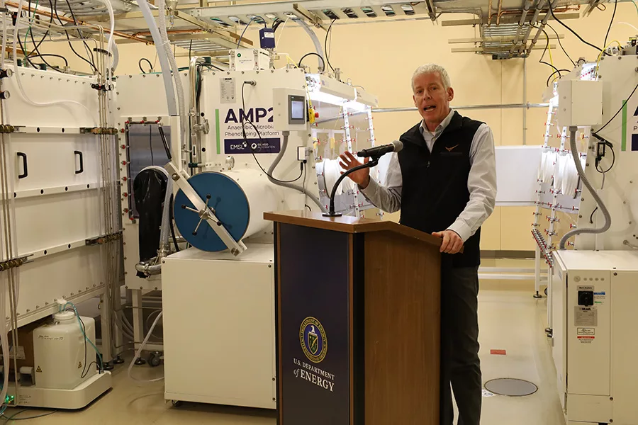 Person speaking at a podium.