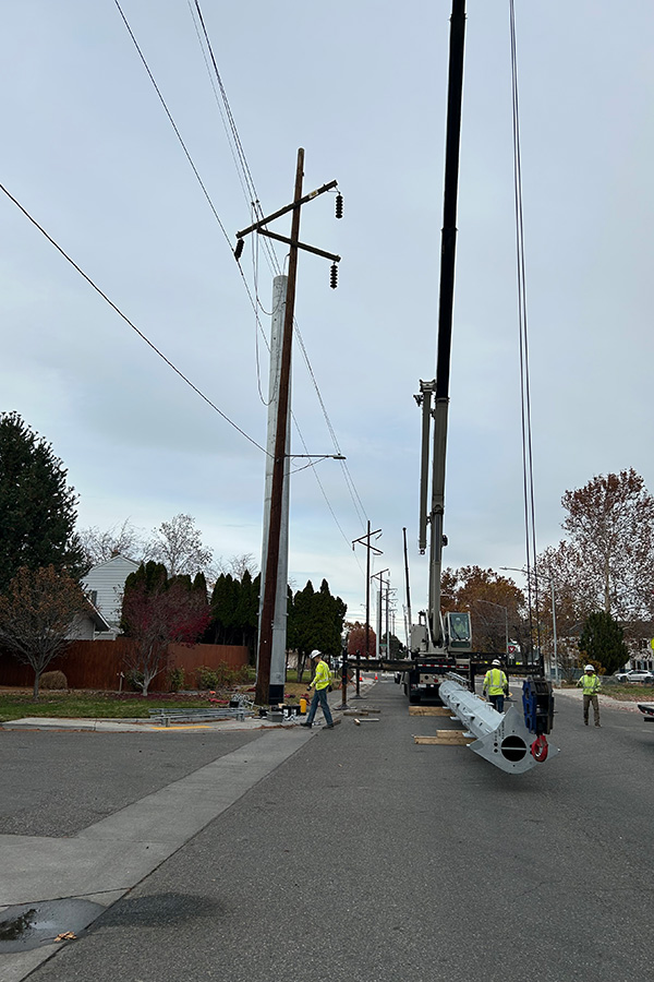 Workers working on transmission lines.