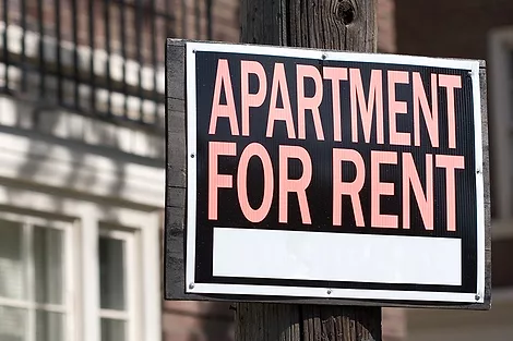 Apartment for rent sign.