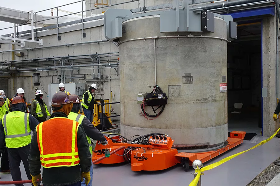 Large cylindrical cask on an industrial pallet jack.