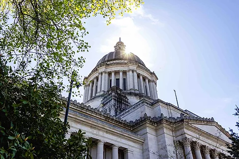 Capitol in Olympia with the sun.