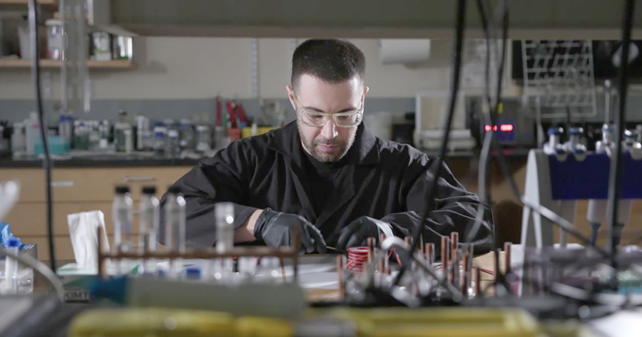 Man in a lab with equipment.