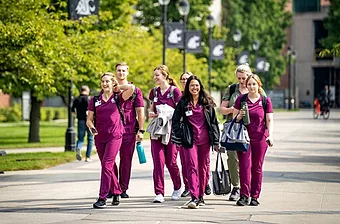 Wsu nursing students walking at wsu spokane