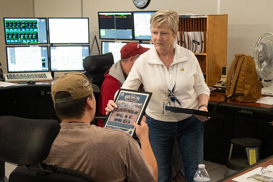 Person receiving a certificate.