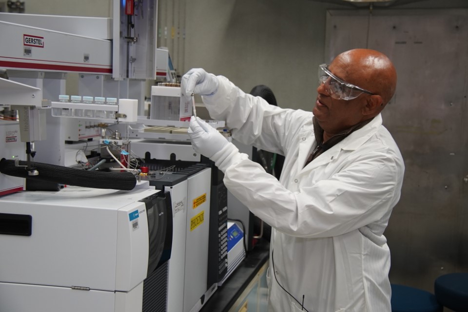 Man in a lab with equipment.
