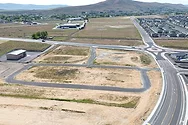 A drone photo of an empty lot.