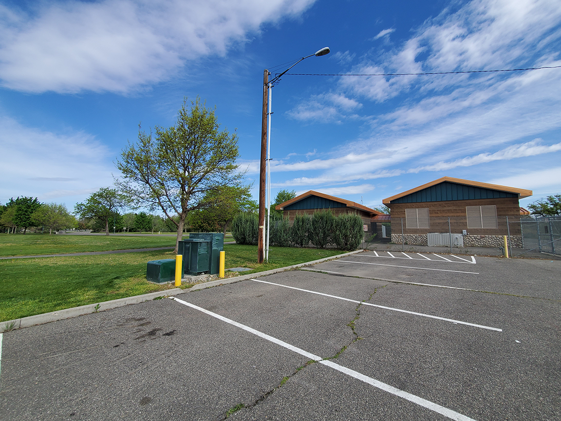 A nondescript building in a park.
