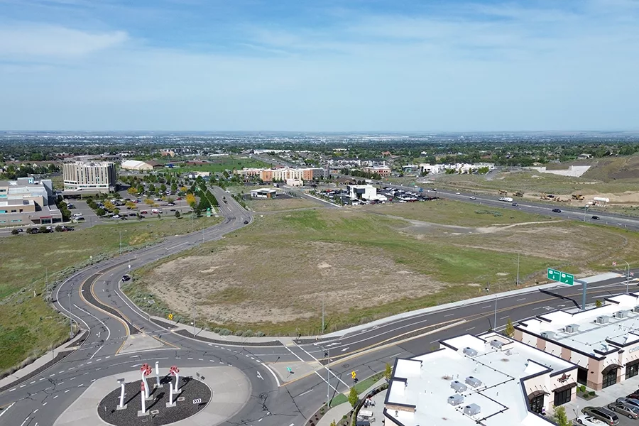 An empty lot near a roundabout.