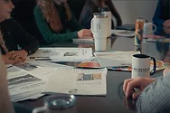 A table with the Journal of Business.