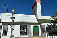 An old white commercial building.