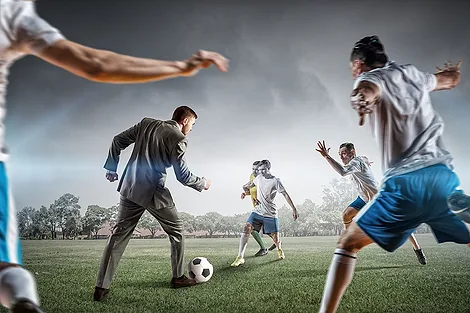 People playing Soccer.