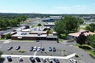 An aerial view of the current city hall along with the museum off to the right.