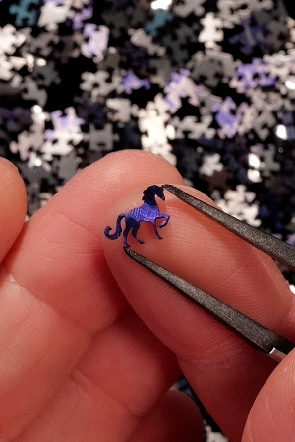 A tiny horse piece.