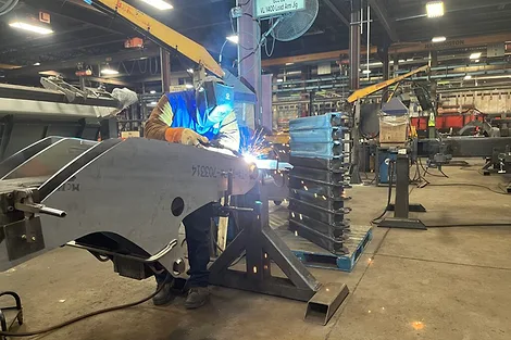 A person welding.