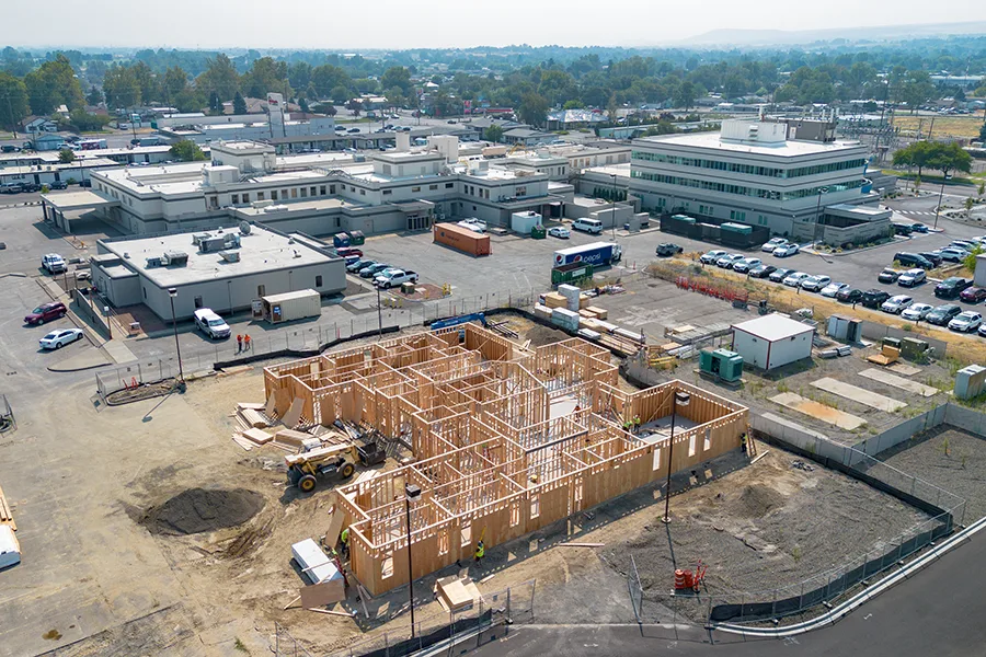 An aerial view of the construction site behind the Recovery Center.