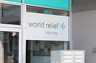A sign that reads "world relief".