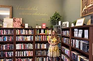 A woman in a bookstore.
