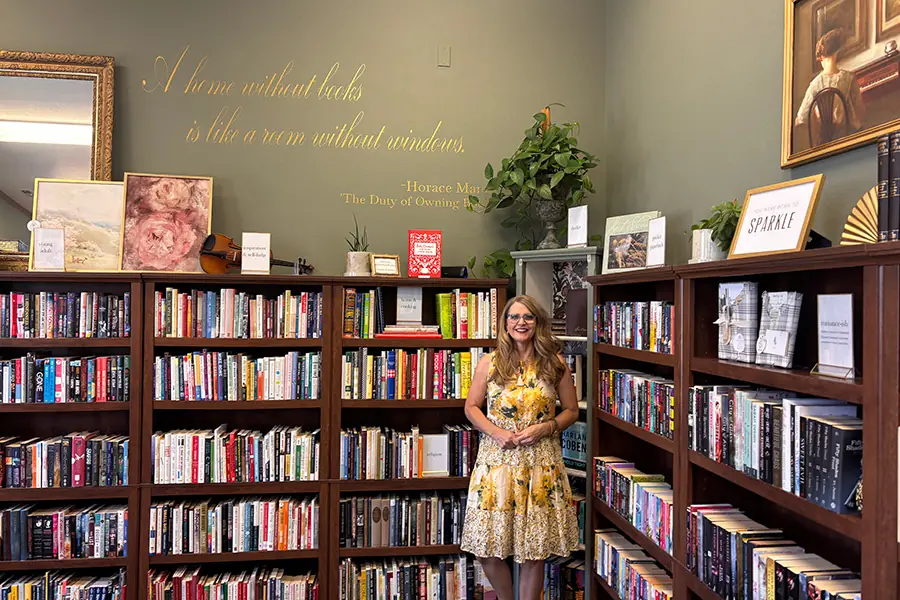 A woman in a bookstore.