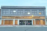 A building with a facade removed.