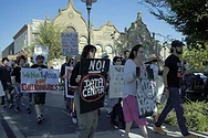 Protesters with anti-data center signs